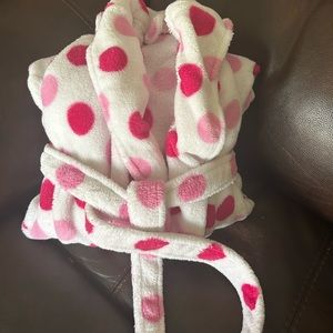 Red and pink polka dot robe.